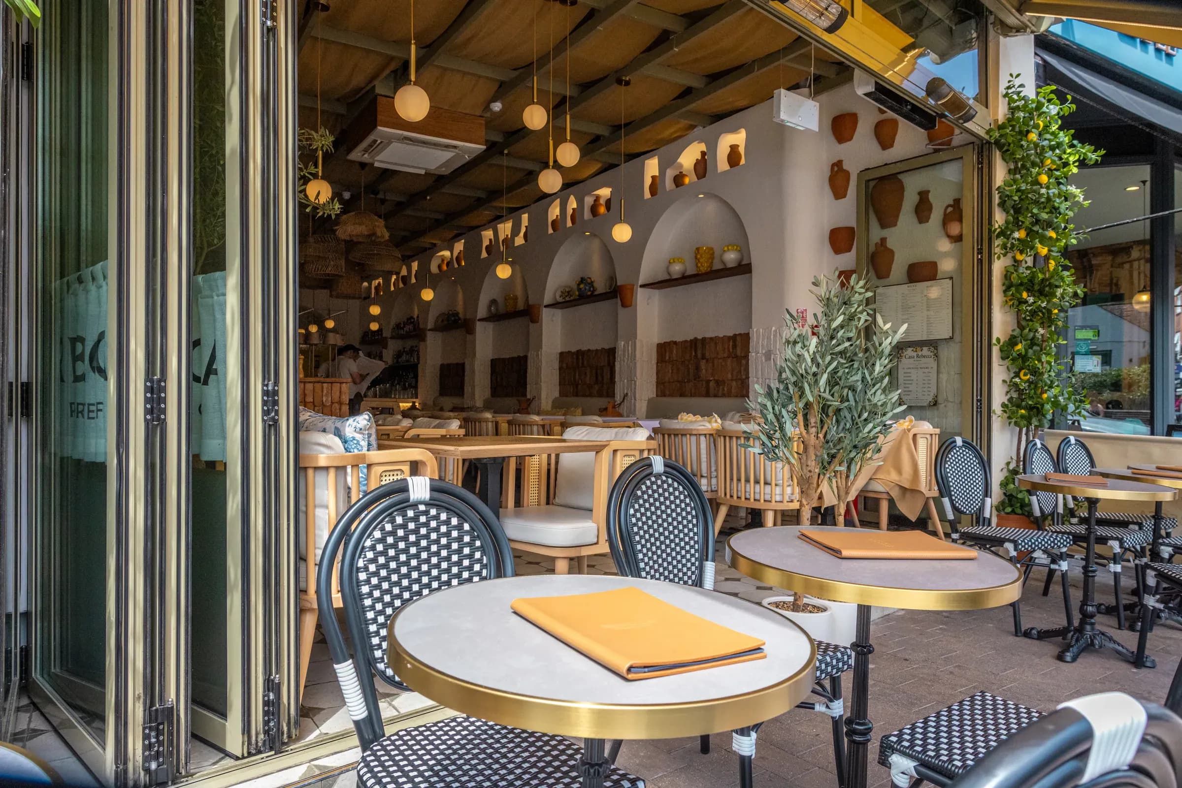 The terrace with bi-fold doors thrown open