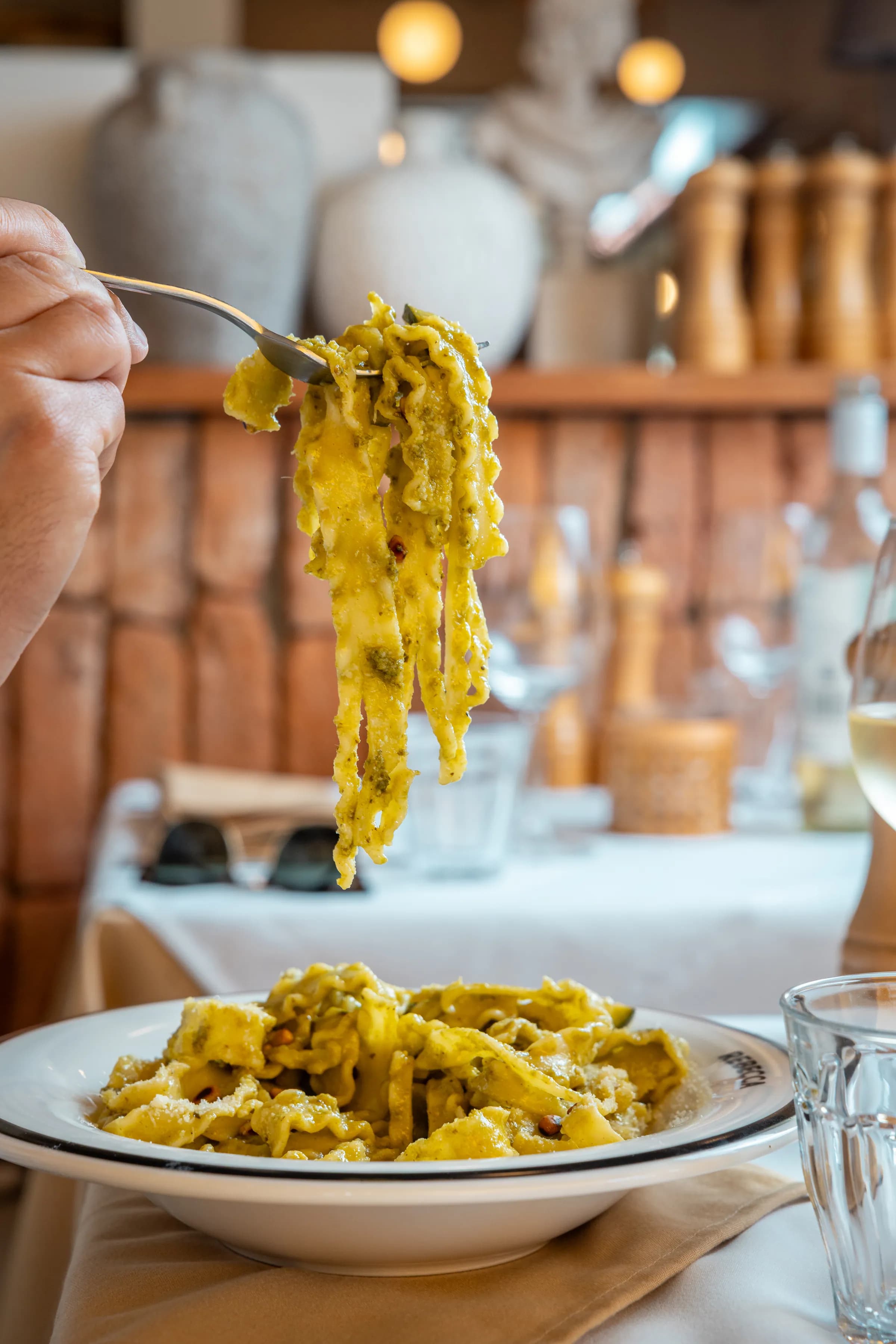 Pasta lifted from the pan